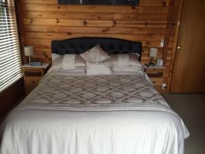 Postel nebo postele na pokoji v ubytování Travellers Retreat B&B