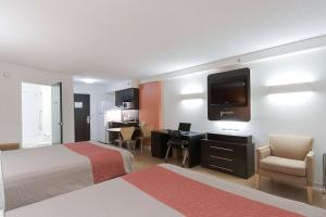 Ένα ή περισσότερα κρεβάτια σε δωμάτιο στο Motel 6-Brandon, MB +27 φωτογραφίες