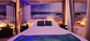 a bedroom with a bed with a view of the ocean at Ocean Spa Oasis in Port Saint Lucie +18 photos