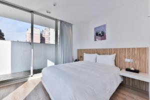 Postel nebo postele na pokoji v ubytování Hotel Mapp