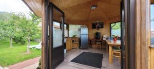 an open kitchen and dining area of a house at Casa Aryana, adults only in Bran