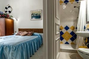 Postel nebo postele na pokoji v ubytování Il Veliero B&B
