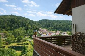 a balcony of a house with a view of a town at Haus Sommerseit'n Ruhe-Natur-Genuss in Hirschbach