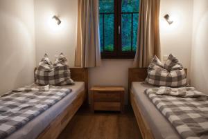 Ένα ή περισσότερα κρεβάτια σε δωμάτιο στο Haus Waldfrieden