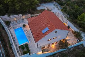 an aerial view of a house with a red roof at Villa Aries in Supetar