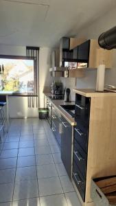 Nhà bếp/bếp nhỏ tại Ferienwohnung Fliehr