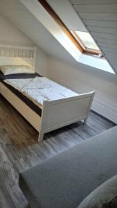 Giường trong phòng chung tại Ferienwohnung Fliehr