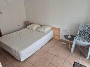 Giường trong phòng chung tại Maison tout confort 3 chambres et 2 salles de bain