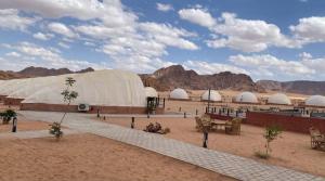 a large tent in the middle of the desert at Shell Luxury Camp in Wadi Rum