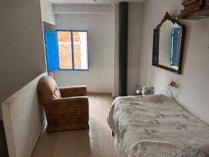 En eller flere senge i et værelse på La Casa los Trancos, a 15 minutos de Cazorla + 24 billeder