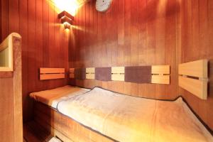Postel nebo postele na pokoji v ubytování Hotel Coco Grand Kitasenju