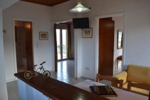 a bike sitting on a counter in a living room at Digenis Studios in Lygia