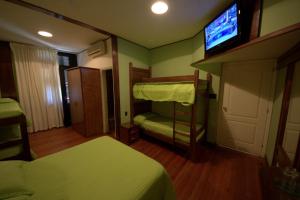Postel nebo postele na pokoji v ubytování Sur Hotel