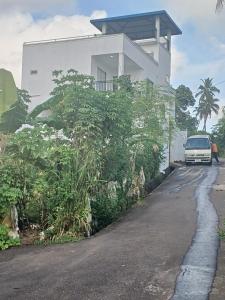 a car parked in front of a house at msm diamond villa in Ragama