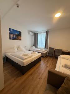 Giường trong phòng chung tại Hotel Vogelweiderhof +38 ảnh