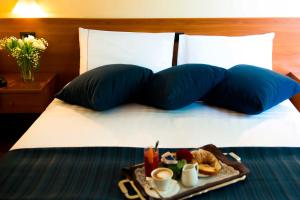 Postel nebo postele na pokoji v ubytování Park Hotel