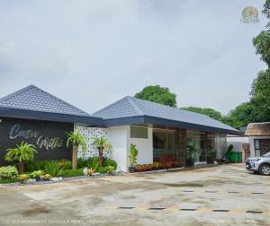 a view of the front of a hotel with a parking lot at Casa Mithi Private Villas Resort in Mexico