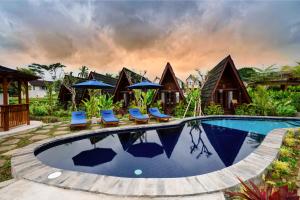 an image of a swimming pool at a villa at Viyana Ubud Villas in Ubud