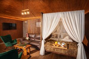 Zona d'estar a Caseddu SPA Chalet