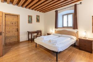 En eller flere senge i et værelse på Alla Regia