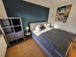 Giường trong phòng chung tại Appartement Luthers Stübchen