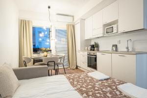 Køkken eller tekøkken på Master Suites City Center By BookLapland