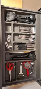 a drawer full of utensils in a refrigerator at Valtour House in Valtournenche