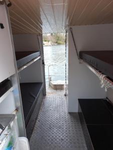 an inside view of the inside of a boat at Kleines Hausboot - ideal für Ihren Angelurlaub! in Lychen