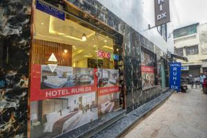 a store window of a hotel rumyk on a street at Hotel Ruhi Dx - Near New Delhi Railway Station & Connaught Place in New Delhi +16 photos