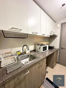 Cozy Modern Studio Unit with PS4 at The Sentinel Residences, Cubao ...