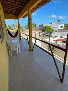 En balkon eller terrasse på Pousada Dunnas do Thyago - preços de inauguração - Praia de Caraúbas - Vista para o mar e para as dunas