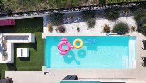 Swimmingpoolen hos eller tæt på Villa 1