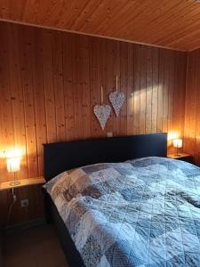 En eller flere senge i et værelse på ferienhaus-am-scharmützelsee