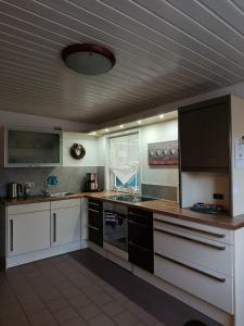 Køkken eller tekøkken på ferienhaus-am-scharmützelsee