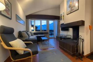 Et opholdsområde på Ferienwohnung Murschetg