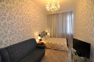 TV a/nebo společenská místnost v ubytování Voskhod Hotel