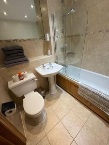 Et badeværelse på Mill Lane Farm Holiday Cottages