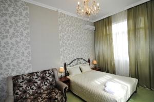 Postel nebo postele na pokoji v ubytování Voskhod Hotel + 37 fotografií