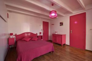 En eller flere senge i et værelse på Villa le 180 cinq