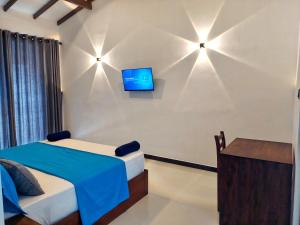 Et tv og/eller underholdning på Sweden Inn Guesthouse