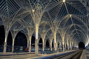 a train station with rows of white trees in it at spacious guest rooms in Lisbon
