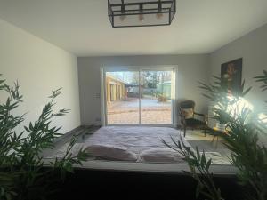 Giường trong phòng chung tại Demeure de Charme de la Gravière +42 ảnh