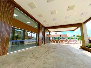 a large building with a large glass door at Spazzio Diroma com acesso ao Acqua Park todos os dias in Caldas Novas +49 photos
