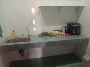 Køkken eller tekøkken på Blue Ocean Hostel + 4 billeder