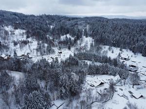 an aerial view of a village in the snow at Apartmány Bramborka in Janov nad Nisou