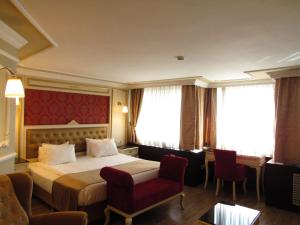 Postel nebo postele na pokoji v ubytování Kadikoy Park Suites + 37 fotografií
