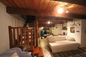 Posteľ alebo postele v izbe v ubytovaní B&B Vecchio Torchio di Bard