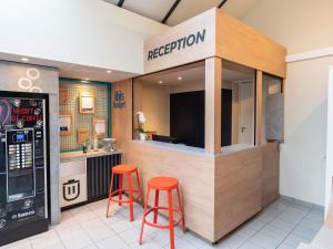 Lobbyen eller receptionen på Hotel Ibis Budget Rennes Cesson