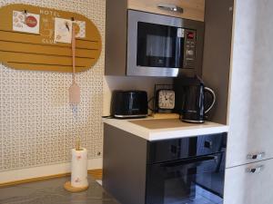 Kuhinja ili čajna kuhinja u objektu Maison Prestige +14 fotografija