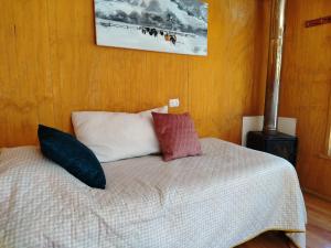 En eller flere senge i et værelse på Cabañas el Remanso